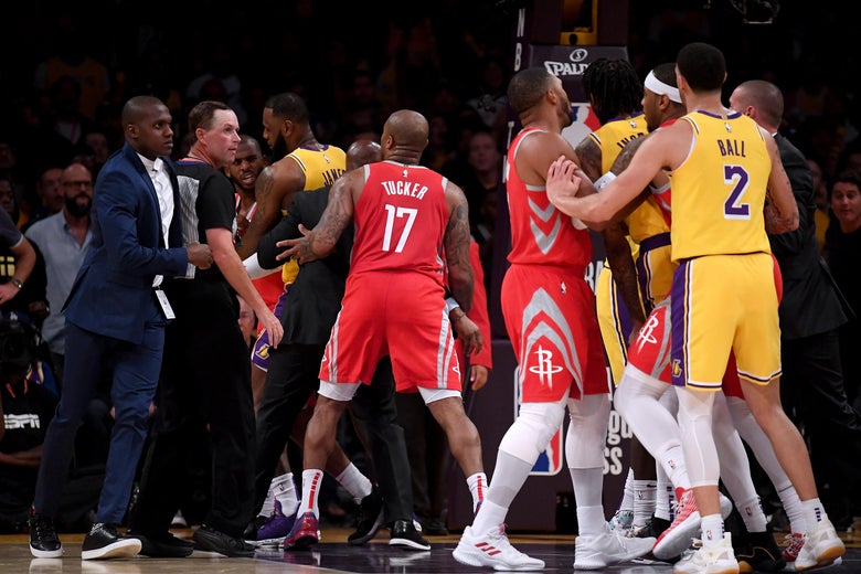 LOS ANGELES, CA - OCTOBER 20: Chris Paul #3 of the Houston Rockets is restrained by LeBron James #23 of the Los Angeles Lakers after a fight involving Rajon Rondo #9 and Brandon Ingram #14 of the Los Angeles Lakers during a 124-1115 Rockets win at Staples Center on October 20, 2018 in Los Angeles, California. (Photo by Harry How/Getty Images)